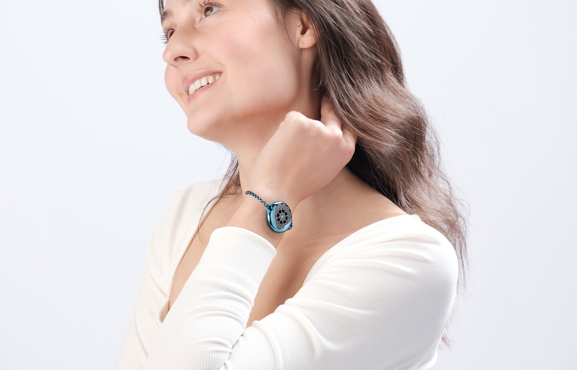 Woman wearing a one-touch activation safety bracelet for emergency help