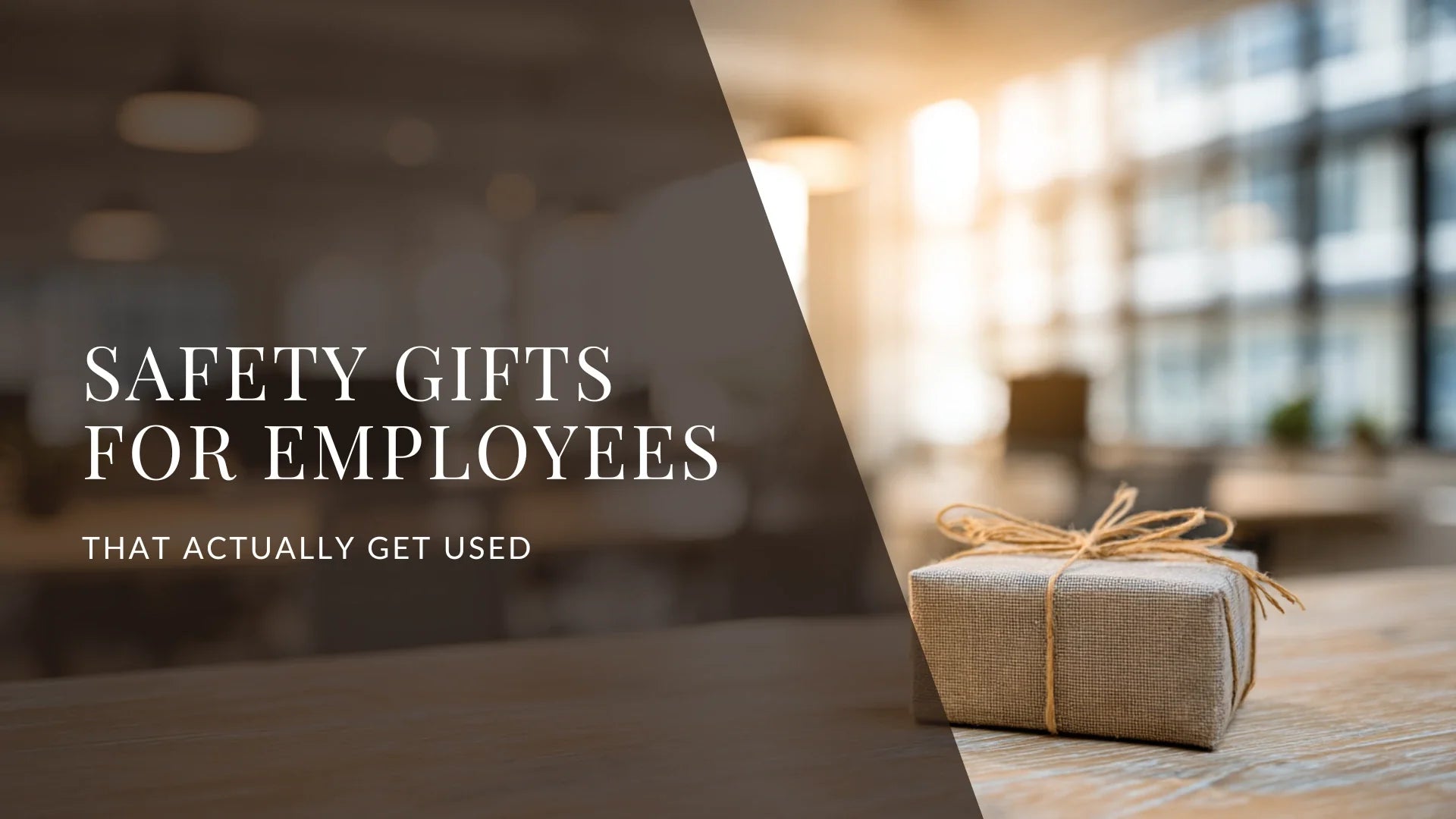 A minimalist, elegantly wrapped gift box sitting on a light wood desk in a bright, modern sun-drenched office, symbolizing a corporate culture of care and employee safety.