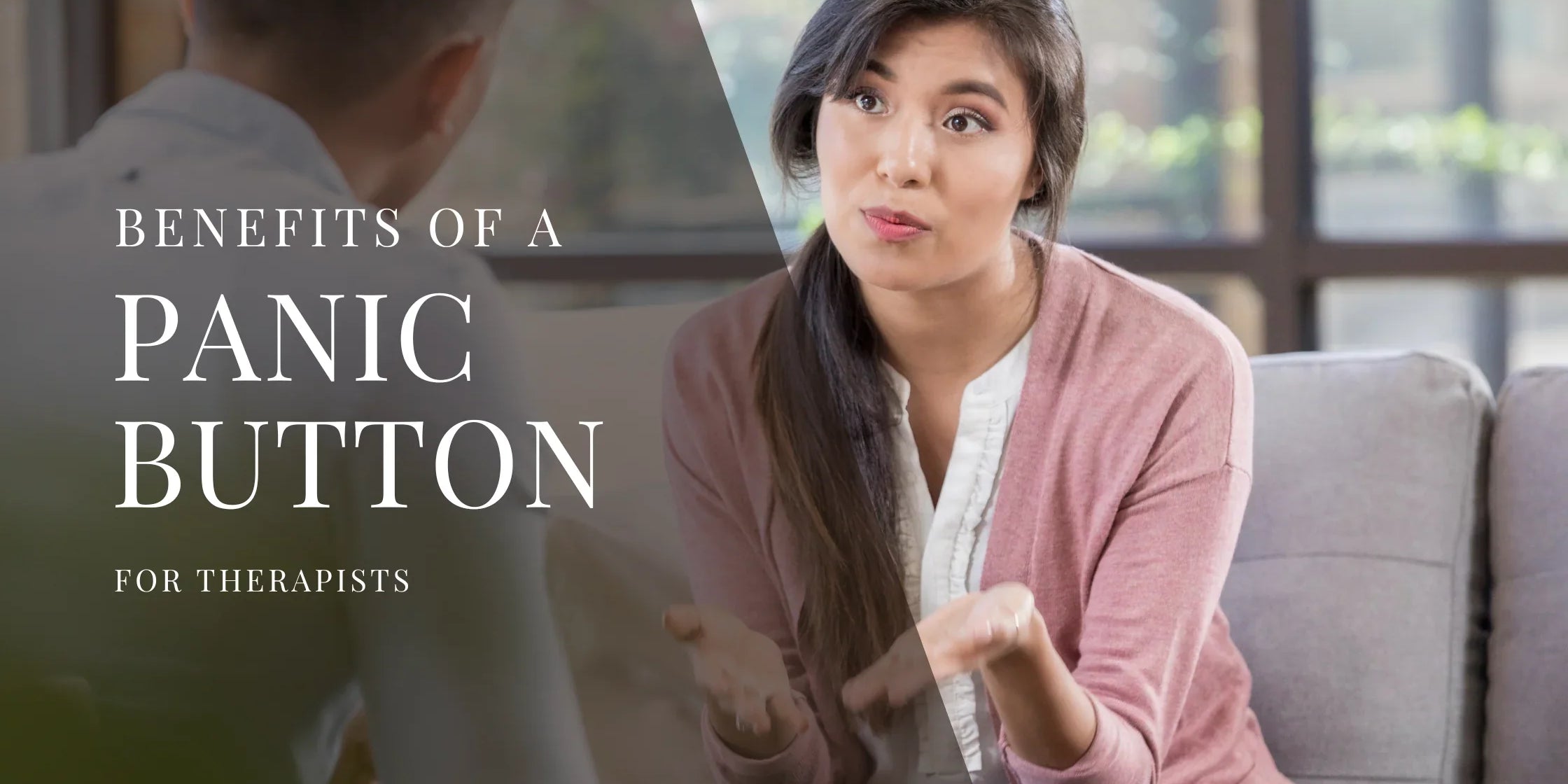 A therapist sits on a couch speaking with a client, using expressive hand gestures during a conversation in a bright, comfortable office.