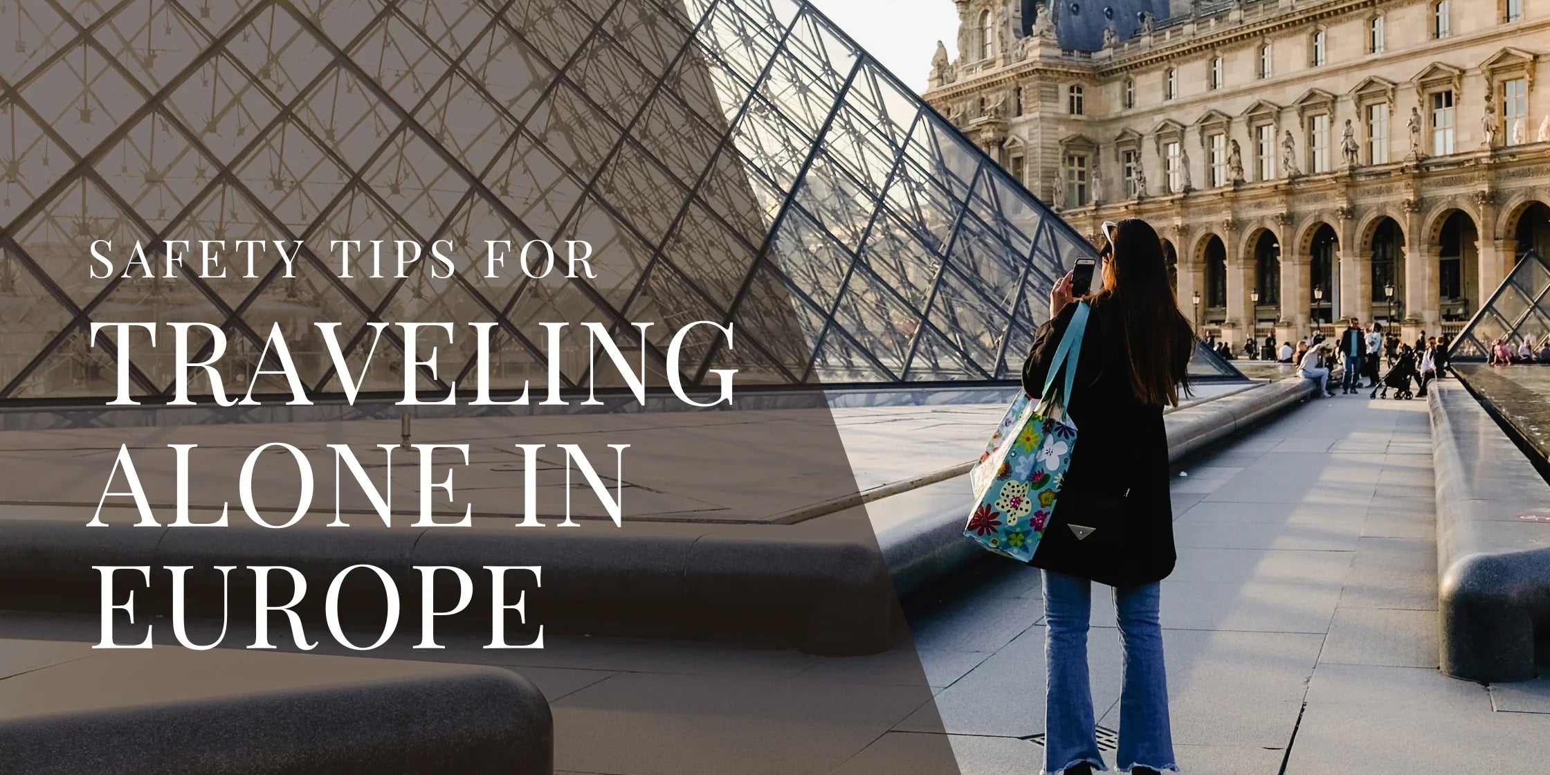 A woman traveling alone photographs the Louvre Pyramid in Paris on a sunny day, standing near the glass structure with the historic museum building in the background.