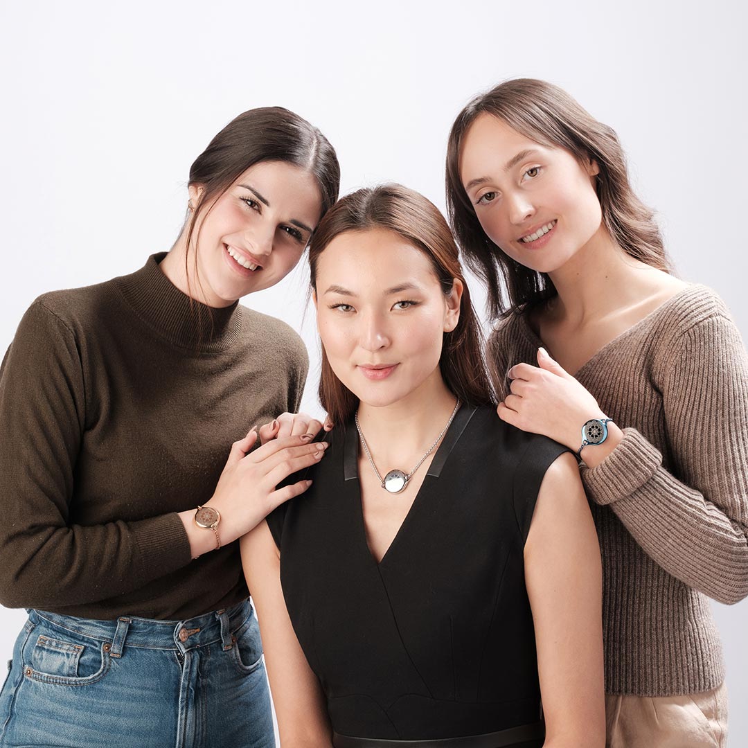 Women using ResQ personal safety jewelry, including emergency alert bracelets and a one-touch SOS necklace—designed for women’s everyday protection, personal security, and wearable safety technology.
