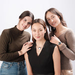 Women using ResQ personal safety jewelry, including emergency alert bracelets and a one-touch SOS necklace—designed for women’s everyday protection, personal security, and wearable safety technology.