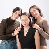 Women using ResQ personal safety jewelry, including emergency alert bracelets and a one-touch SOS necklace—designed for women’s everyday protection, personal security, and wearable safety technology.